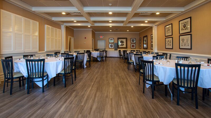 Side dining room with many set tables